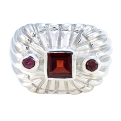 Marie contemporary red gemstone ring with square and round red stones set in textured silver band