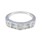 Bruna contemporary white gemstone ring with five bezel set white stones on polished silver band
