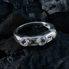 Bruna contemporary white gemstone ring with polished silver band and mixed round and square white stones set in bezels