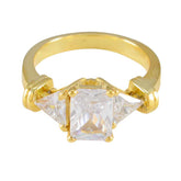 Daniela gold ring featuring contemporary white trilogy ring design with three clear gemstones