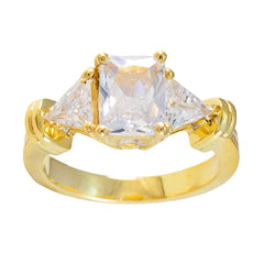 Daniela gold ring with large clear stones featuring contemporary white trilogy ring design