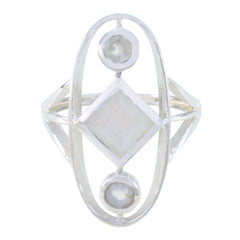 Lily contemporary white trilogy ring in sterling silver with three bezel moonstone settings and geometric design