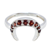 Isabelle feminine red gemstone ring with crescent-shaped design and silver band