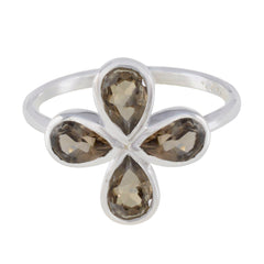 Hana floral brown gemstone ring featuring four teardrop-shaped brown stones set in silver band