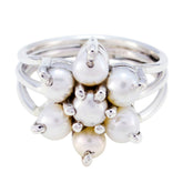 Kristine silver floral pearl statement ring with cluster of small white pearls in floral design