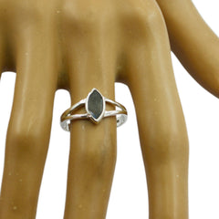 Jiwoo geometric black solitaire ring with marquise stone on silver band worn on finger