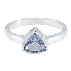 Putri geometric blue solitaire ring with silver band and triangular blue gemstone centerpiece