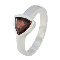 Riya geometric red solitaire ring with a triangular red stone set in a silver band