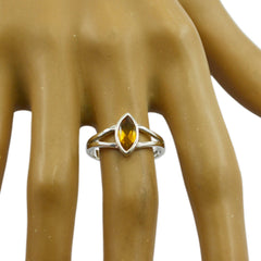 Bella geometric yellow gemstone ring with marquise cut stone on silver band worn on finger