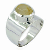 Skylar golden solitaire ring with a polished silver band and a unique golden stone centerpiece