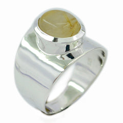 Skylar golden solitaire ring with a polished silver band and a unique golden stone centerpiece