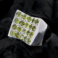 Nella green cocktail ring for women with multiple green gemstones set in silver band