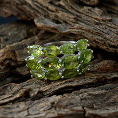 Camila green gemstone cocktail ring with multiple oval green stones set in silver