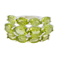 Camila green gemstone cocktail ring featuring multiple oval green stones set in silver band