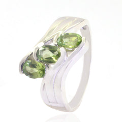 Yasmin silver ring featuring three green gemstones in a stylish setting green gemstone ring for women