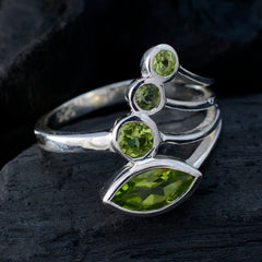 Camila silver green gemstone ring for women with marquise and three round peridot stones