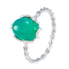 Xiu green gemstone solitaire ring with twisted silver band and polished green stone centerpiece