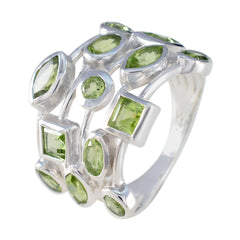 Julieta silver ring featuring multiple green gemstones in various shapes green gemstone statement ring