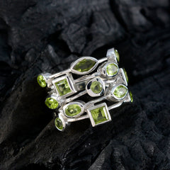 Julieta green gemstone statement ring with multiple green stones set in sterling silver band
