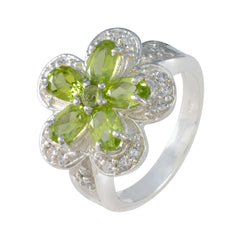 Victoria green gemstone statement ring with flower-shaped green stones and silver band