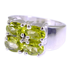 Hannah silver band ring with six oval peridot stones clustered in prong setting green gemstone statement ring