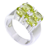 Hannah sterling silver band with three oval peridot stones and diamond accents green gemstone statement ring