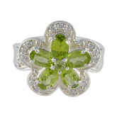 Victoria green gemstone statement ring with flower design and silver band