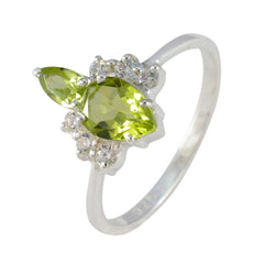 Ha-eun green gemstone toi et moi ring with two marquise green stones and small clear accent gems