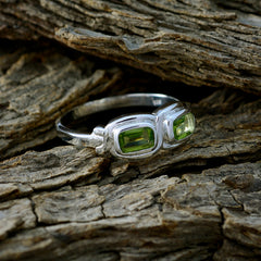 Siti silver green gemstone toi et moi ring with two rectangular green stones on textured wood
