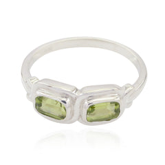 Siti silver ring featuring two rectangular green gemstones in a green gemstone toi et moi ring design