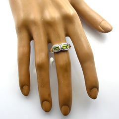 Siti green gemstone toi et moi ring with two rectangular green stones on silver band worn on hand