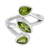 Mariana green gemstone trilogy ring sterling silver open wrap with three peridot stones
