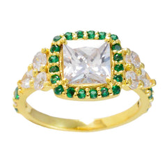 Chen green halo engagement ring with square center stone and gold band adorned with green and white gems