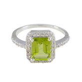 Skylar green halo ring for women with emerald cut green gemstone and diamond accents