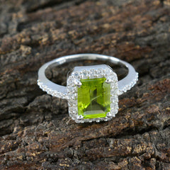 Skylar green halo ring for women with rectangular green gemstone and diamond accents
