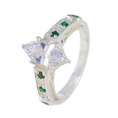 Pauline green halo ring for women with clear center stones and small green accents on silver band