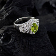 Isadora sterling silver green halo ring for women with oval peridot center and pave diamond accents