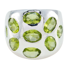 Camila green navratna ring with multiple oval green gemstones set in silver band