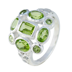 Lourdes sterling silver green navratna ring with mixed oval and emerald cut peridot gemstones cluster