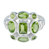 Lourdes sterling silver green navratna ring with multiple oval and rectangular peridot gemstones