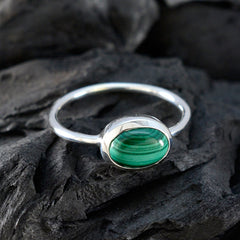 Xiu Green Solitaire Ring with Oval Gemstone Design