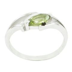 Riya green solitaire ring with marquise cut green gemstone set in silver band