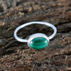 Xiu Green Solitaire Ring with Oval Gemstone Design