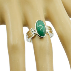 Siti green solitaire ring with oval green stone set in silver band on display hand