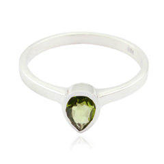 Olivia green solitaire ring with teardrop shaped gemstone and silver band