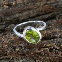 Siti Green Solitaire Ring with Oval Gemstone