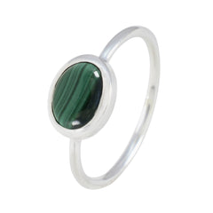 Xiu Green Solitaire Ring with Oval Gemstone Design