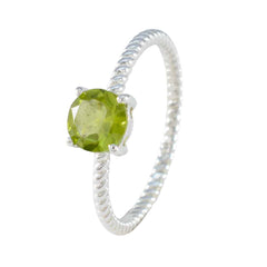 Min-seo Green Solitaire Twist Ring with Gemstone