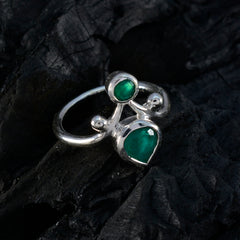 Nisa green toi et moi ring sterling silver band with pear and round green gemstones on black background