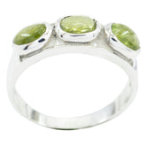 Ha-eun green trilogy gemstone ring with three oval green stones set in silver band